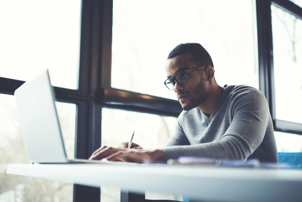 Man working near window